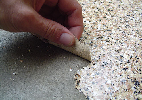 Peeling floor coating — what poor prep looks like in Tampa FL