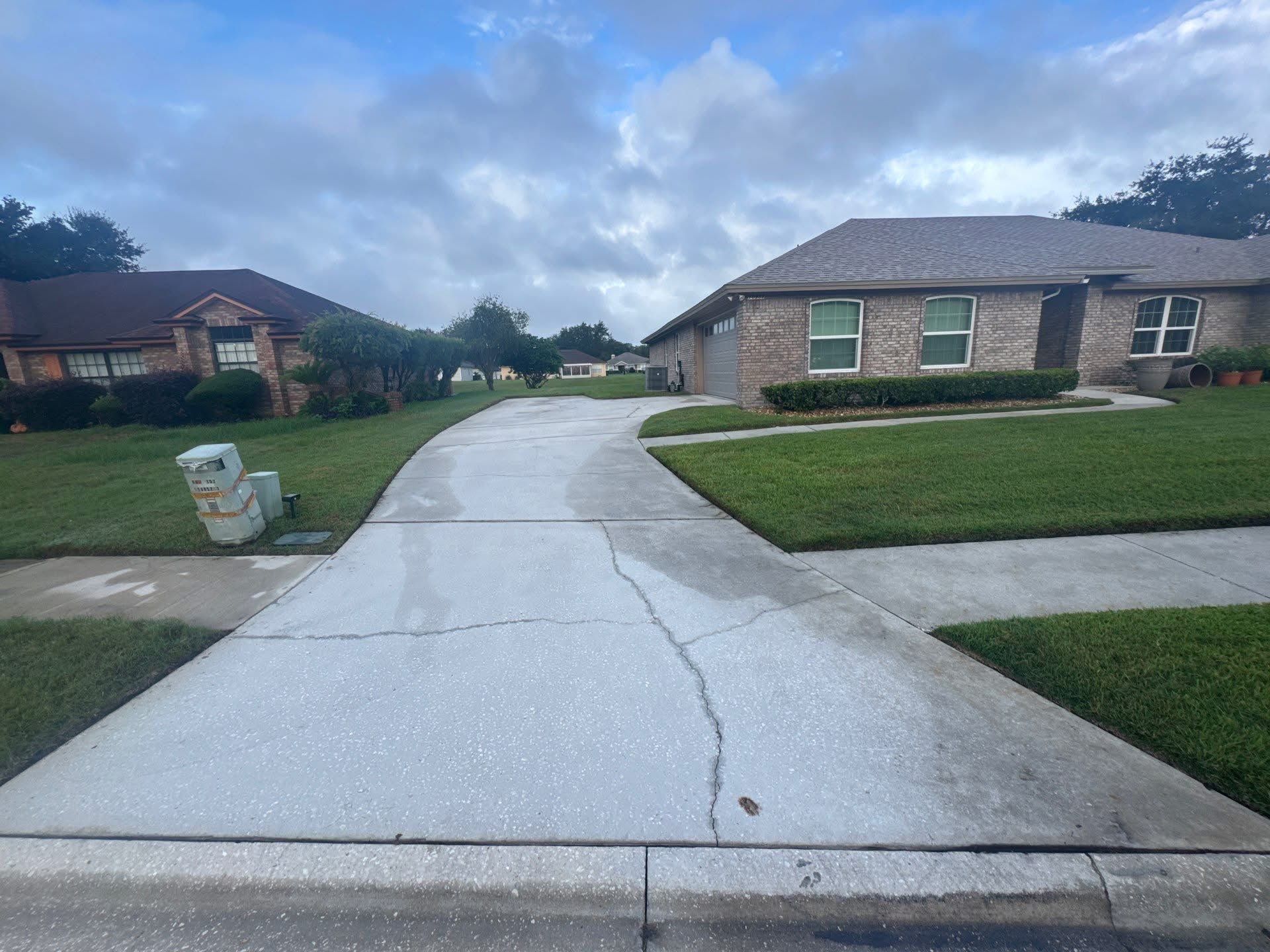 Driveway before coating — Tampa Bay